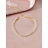 Chaîne de cheville dorée avec strass