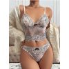 Top caraco et string dentelle blanc et noir 