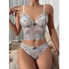 Top caraco et string dentelle blanc et noir 